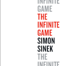 The Infinite Game Photo is the cover of the book The Infinite Game by Simon Sinek. The background is white. Text is printed on the right half of the book. From the top down: Infinite Game in grey text, The Infinite Game in red text, Simon Sinek in black text, The Infinite in grey text
